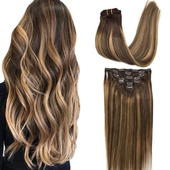 Clip in human hair extensions