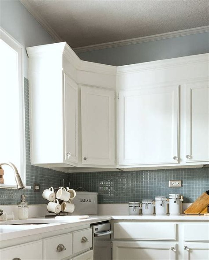 Crown molding on top of kitchen cabinets