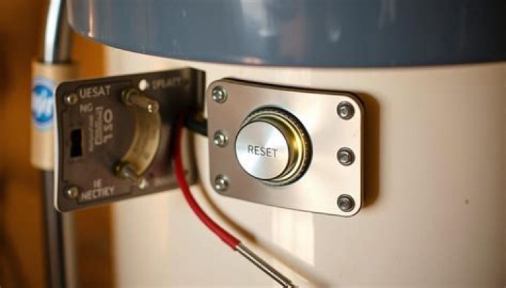 Electric water heater reset button