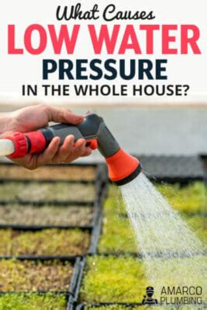 What causes low water pressure in the whole house